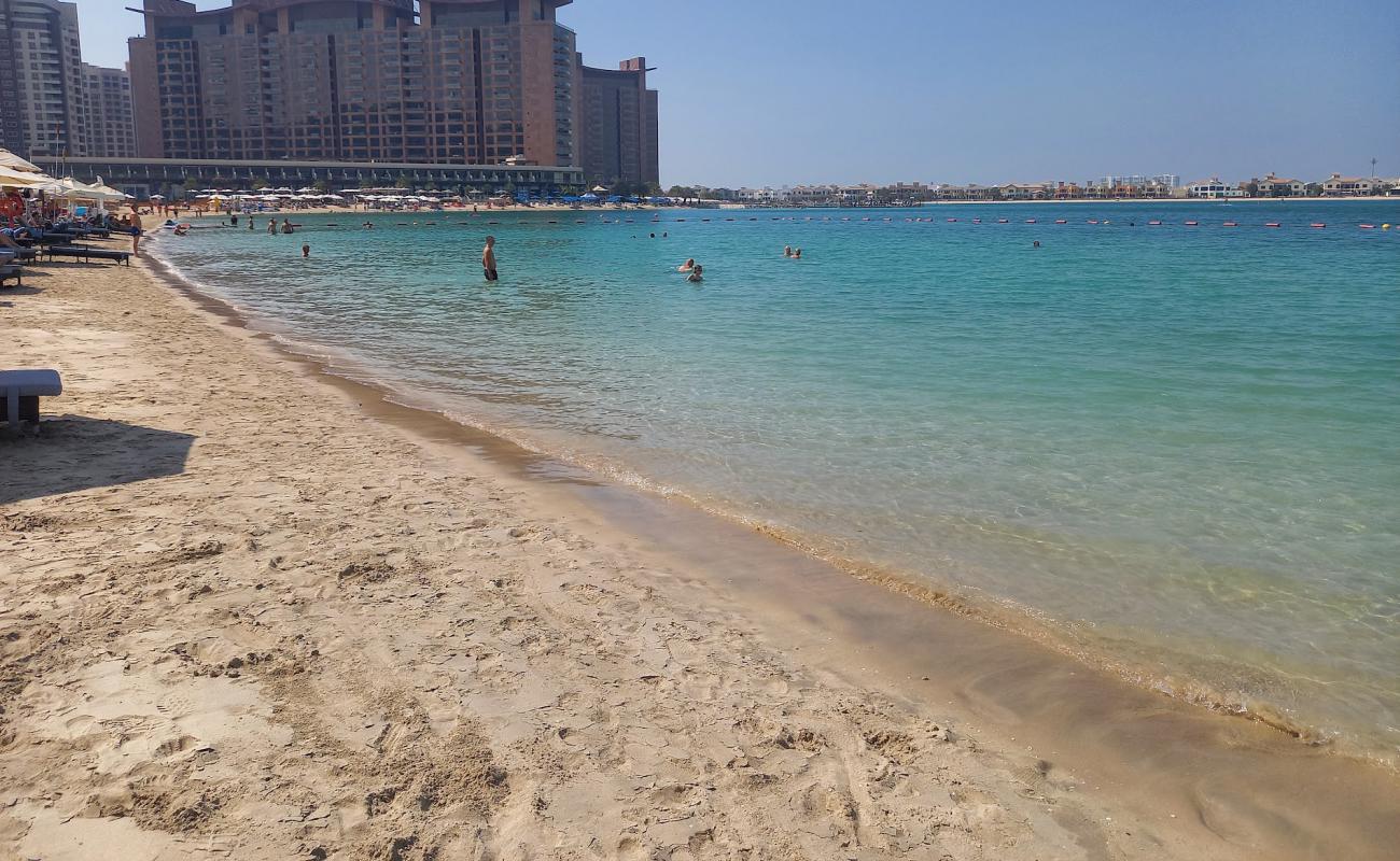 Photo of Riva beach with bright fine sand surface