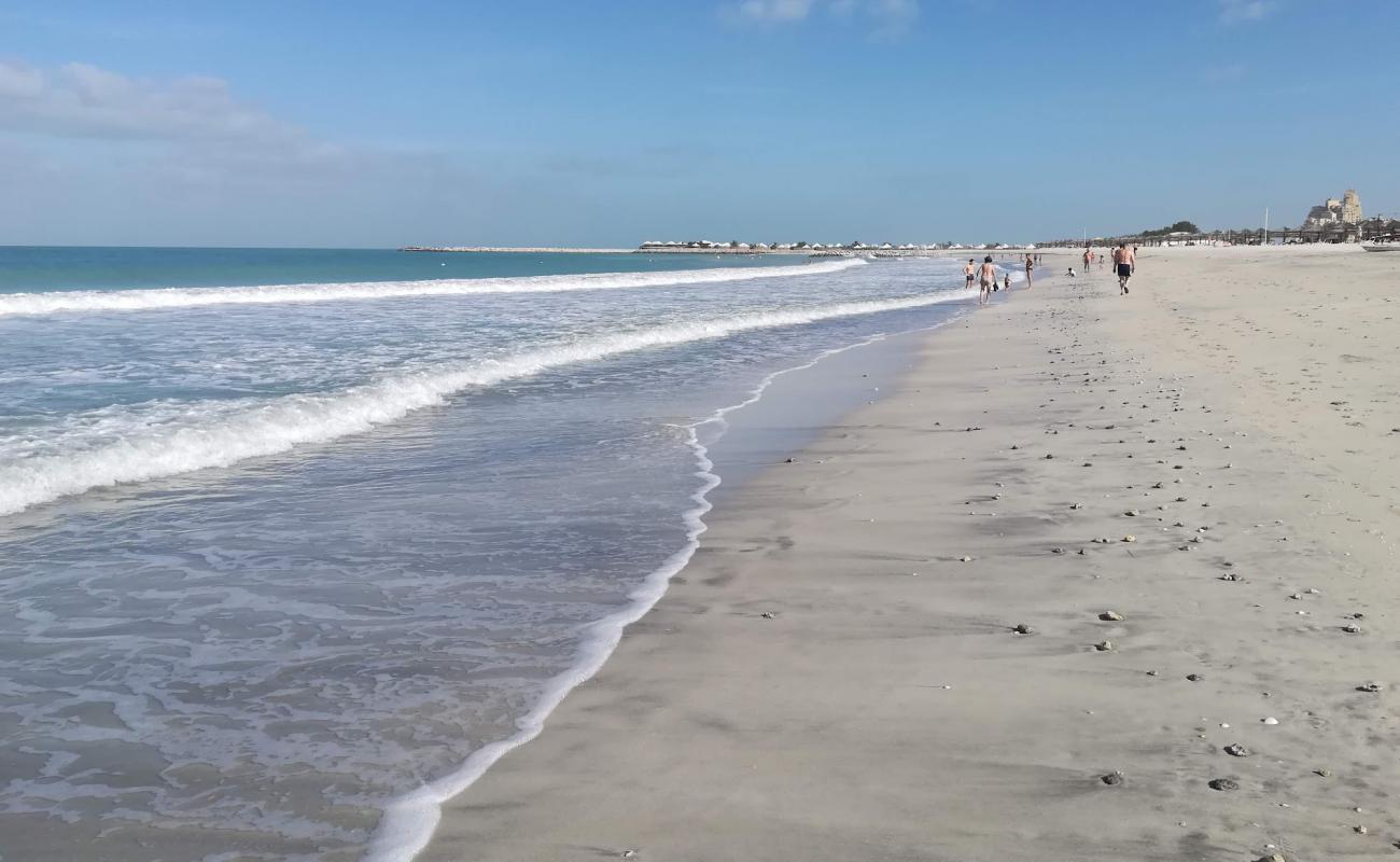 Photo of Al Hamra beach with bright sand surface