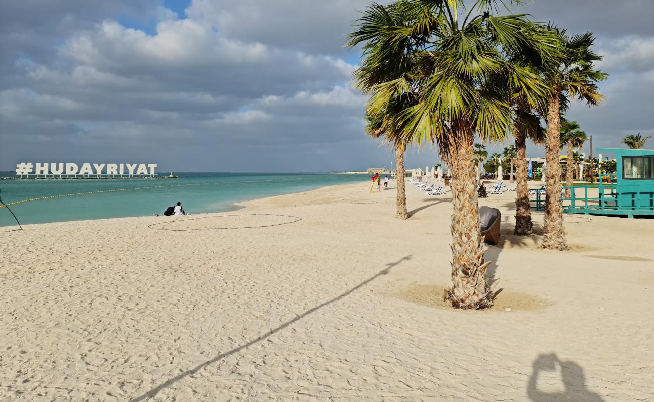 Photo of Al Hudayriat Beach with white sand surface