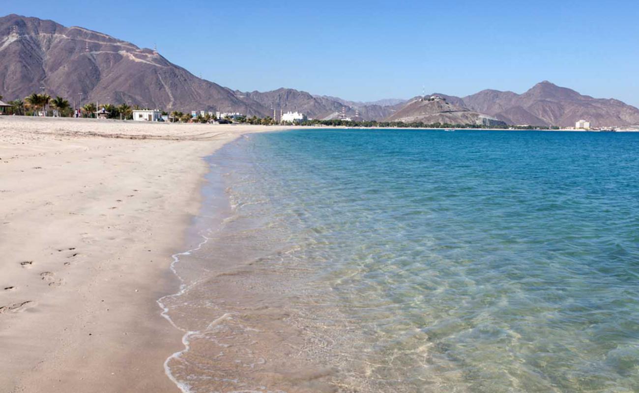 Photo of Umbrella Beach with bright sand surface