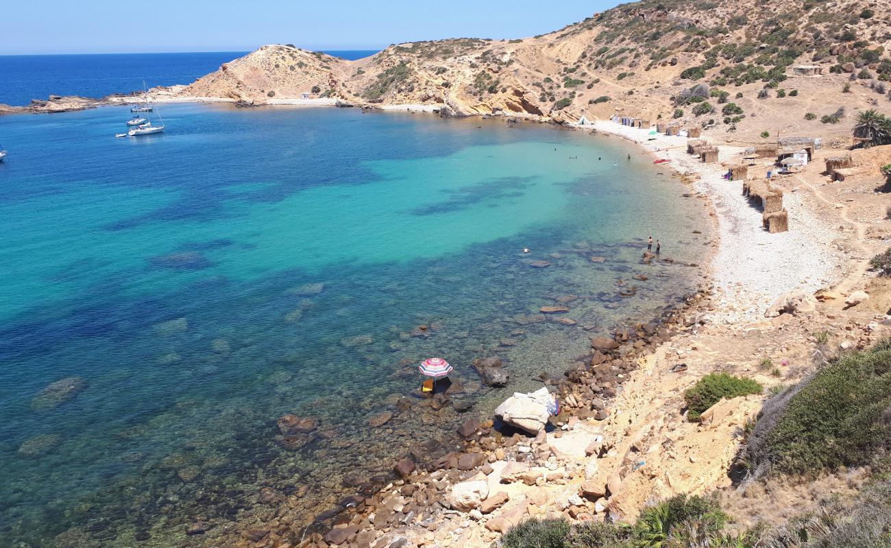 Photo of Korbous Plage with gray pebble surface