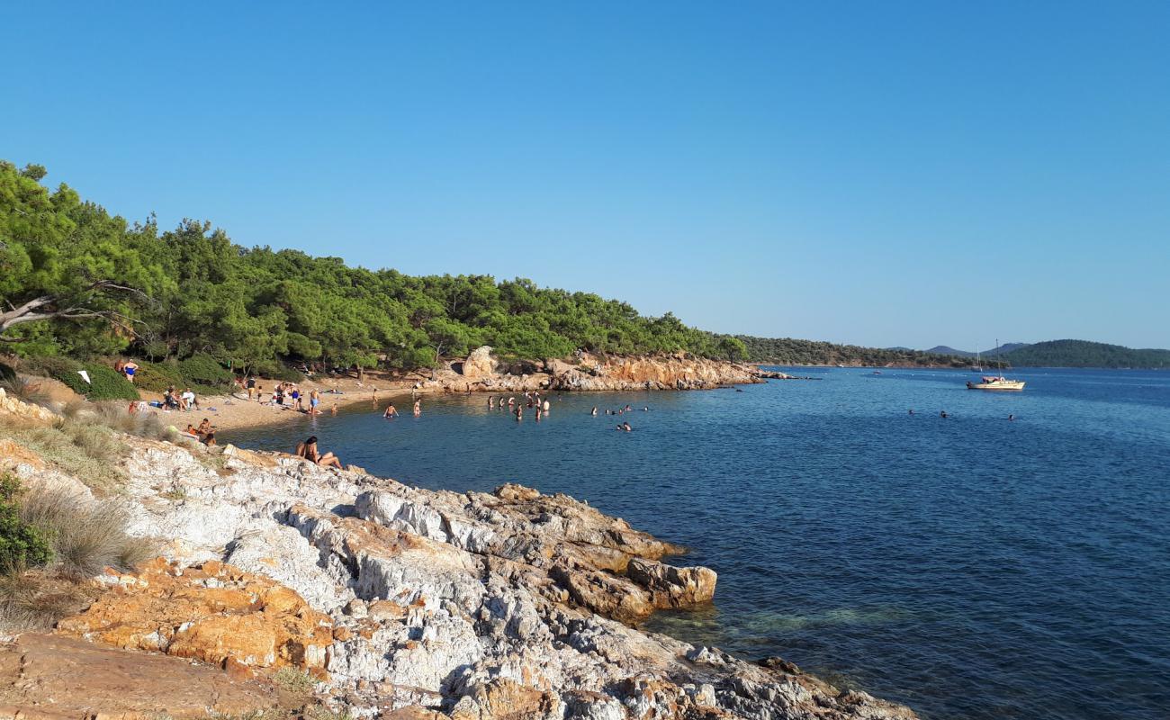 Photo of Kirmizikuyu Cd. beach with light sand &  pebble surface