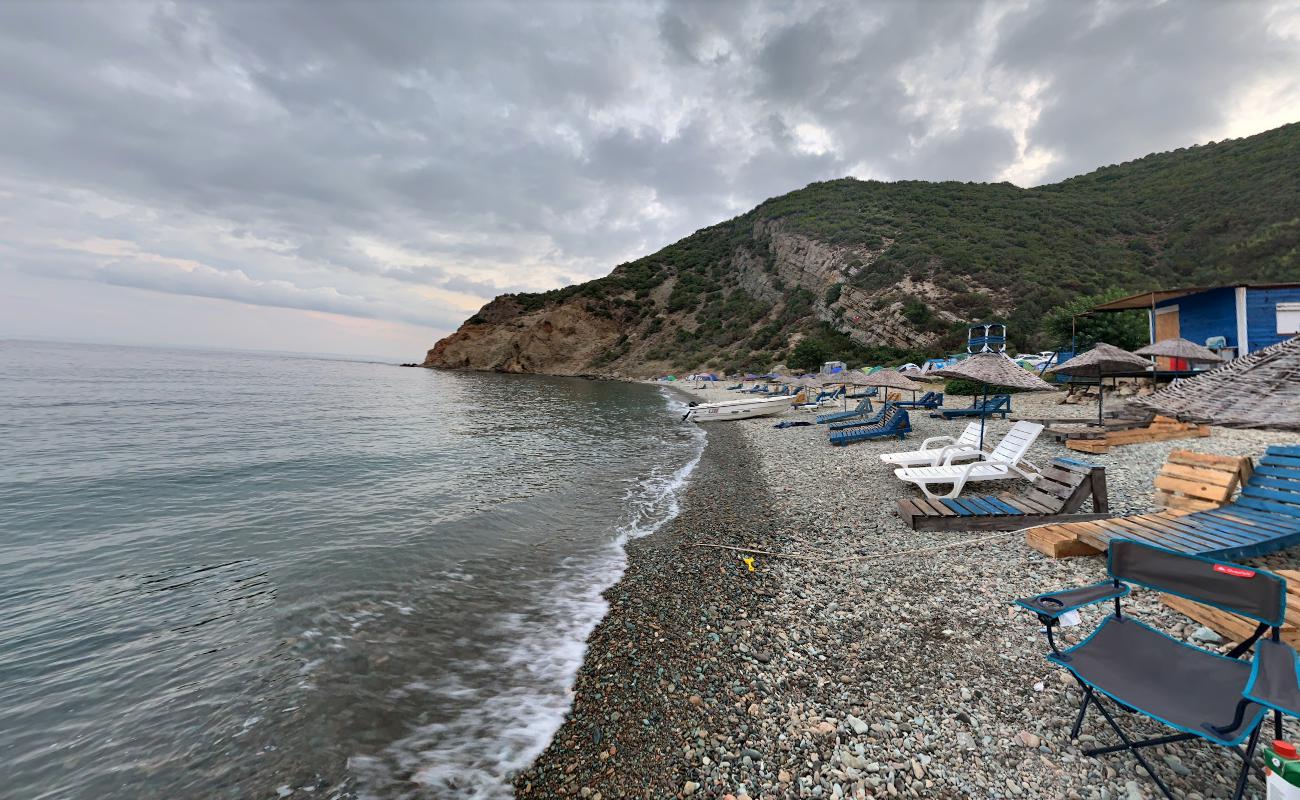 Photo of Komur Limani beach backed by cliffs