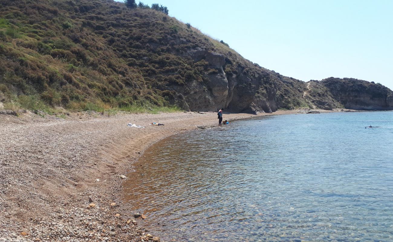 Photo of Misyon beach with brown fine pebble surface