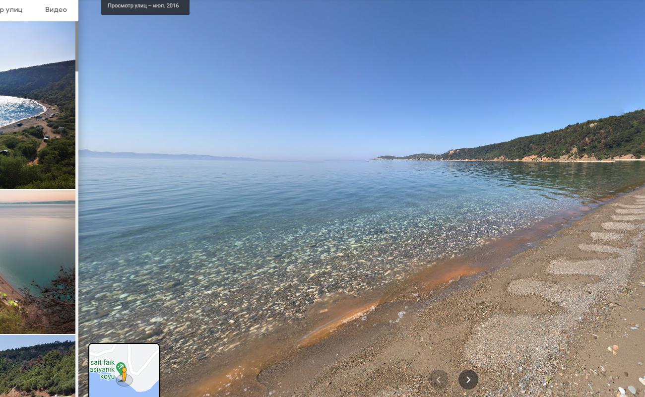 Photo of Sait faik beach backed by cliffs