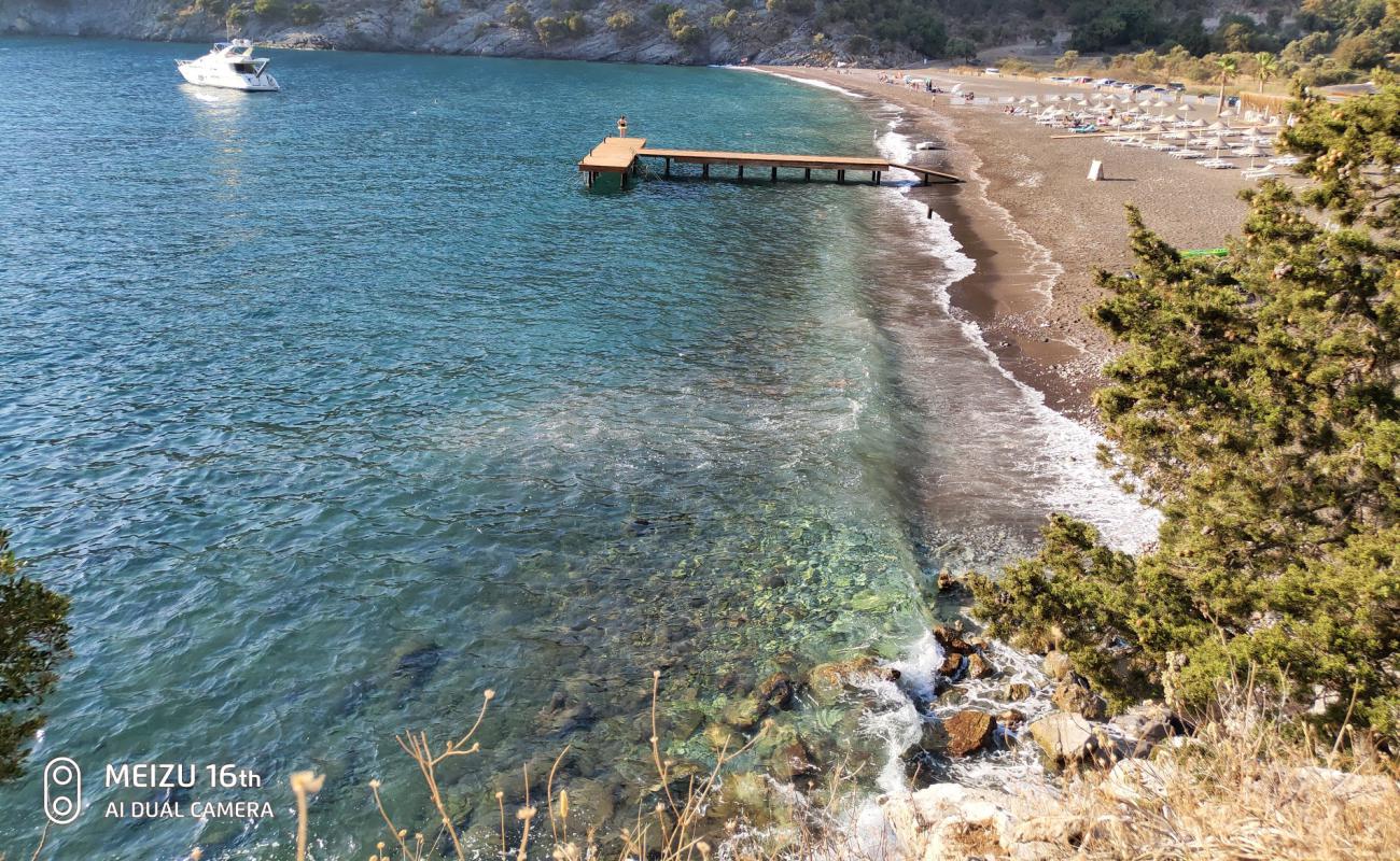 Photo of Candost beach IV with black sand & pebble surface