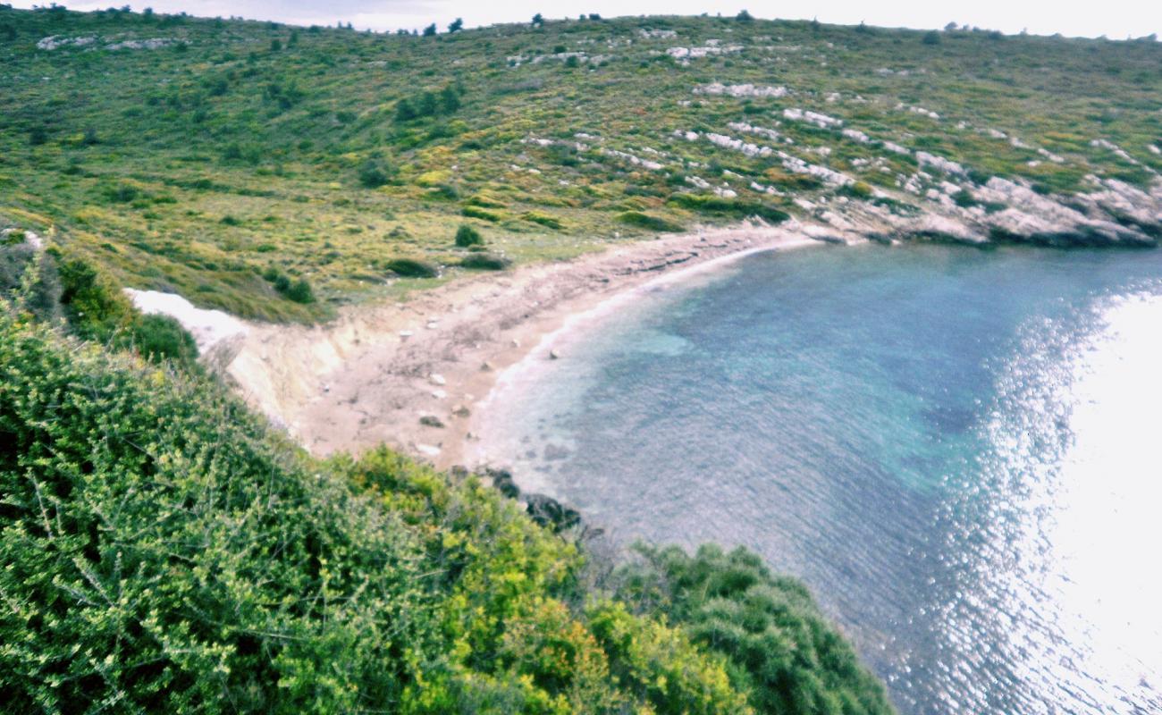 Photo of Denizyildizi beach II with brown sand &  rocks surface