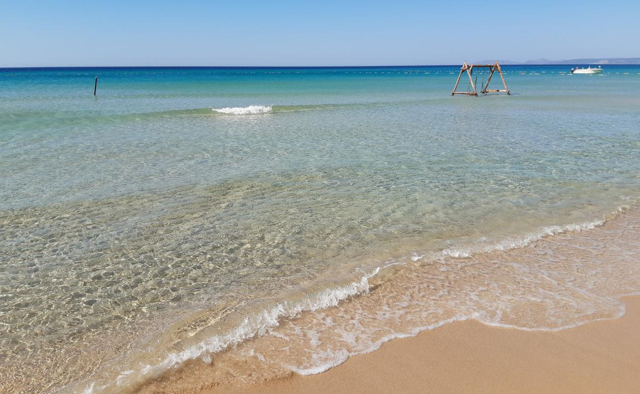 Photo of Dharma Beach Club with bright fine sand surface