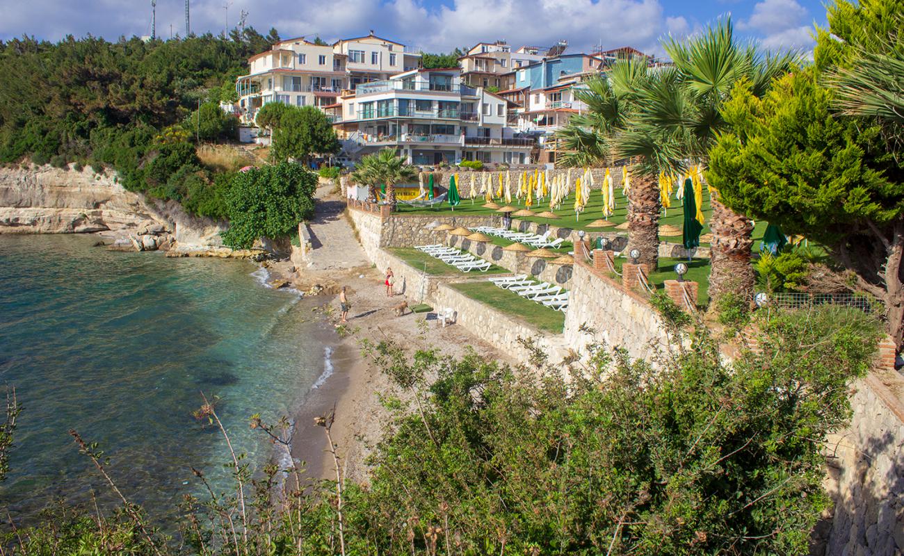 Photo of Aly Beach Club with black sand & pebble surface