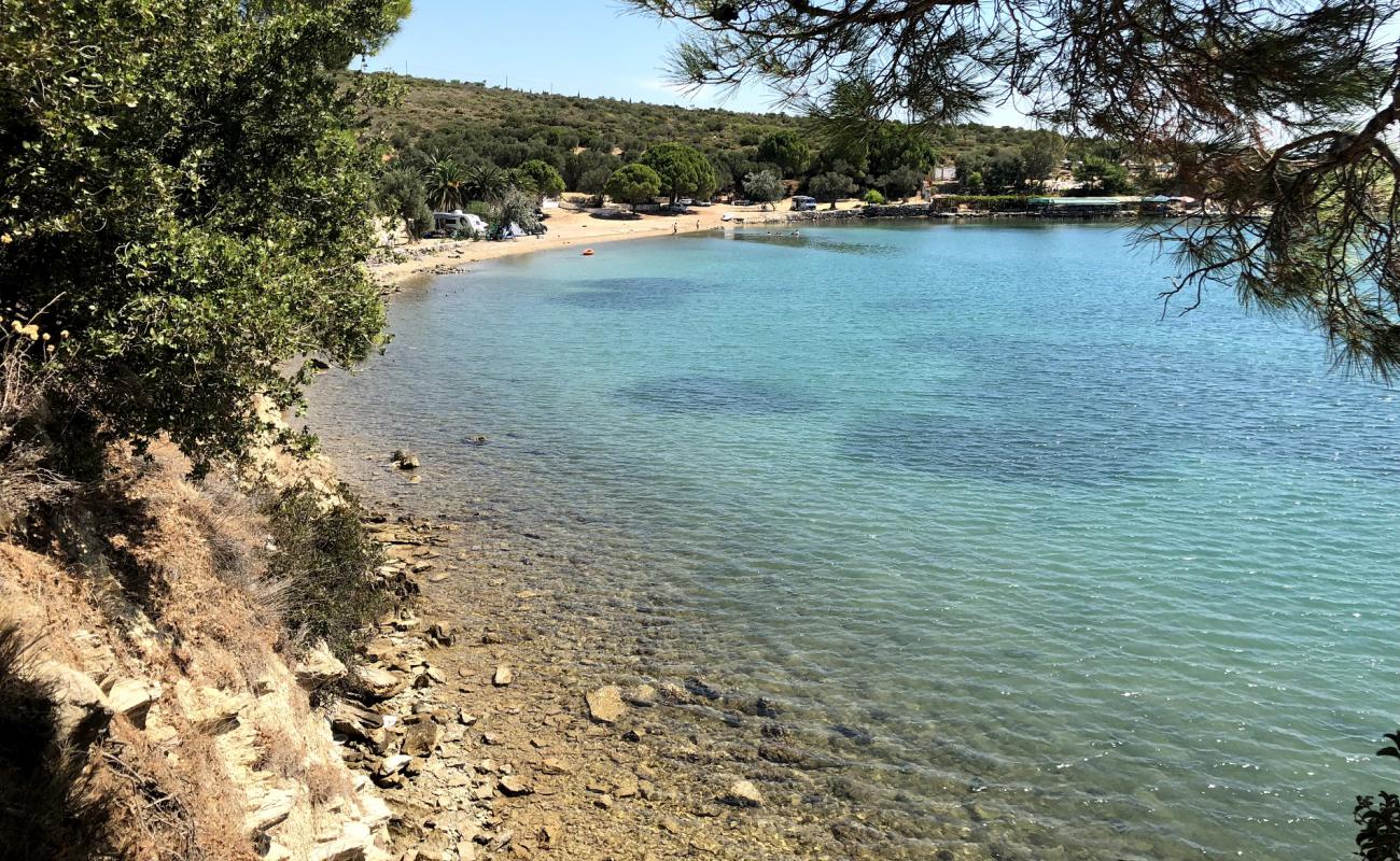 Photo of Huzur Kamp Beach with brown sand &  rocks surface