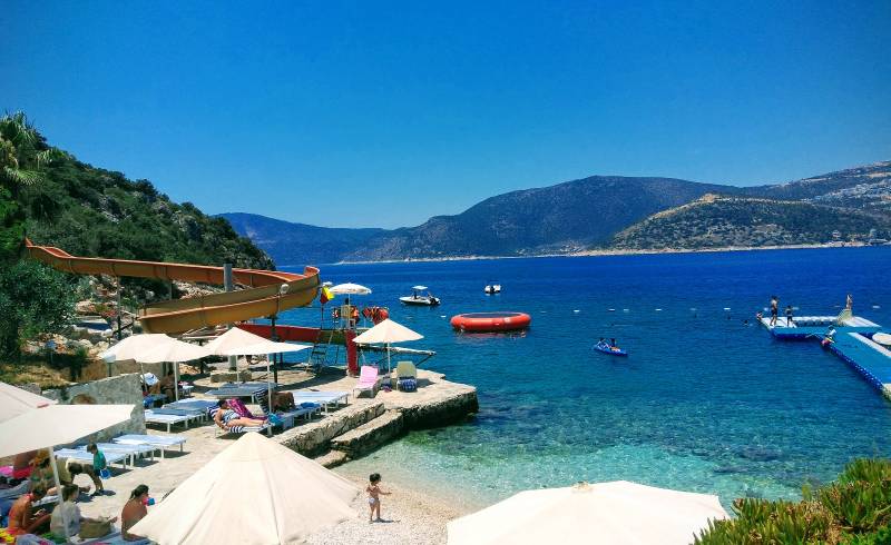 Photo of Beach Park Kalkan with light fine pebble surface