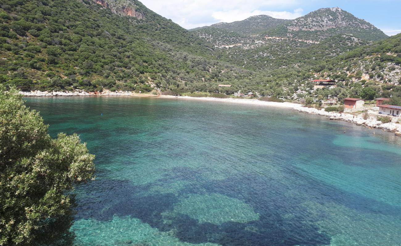 Photo of Inonu bay beach II with brown pebble surface