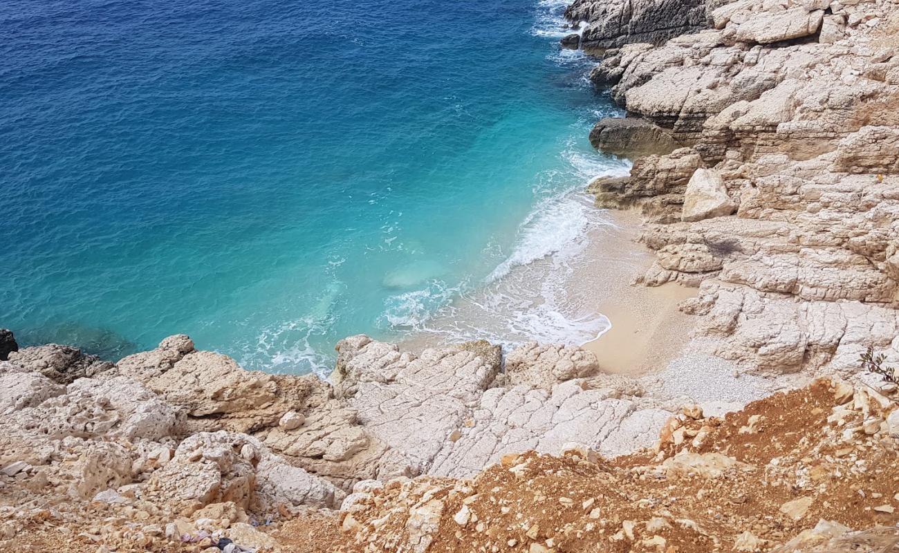 Photo of Small Bay with white pebble surface