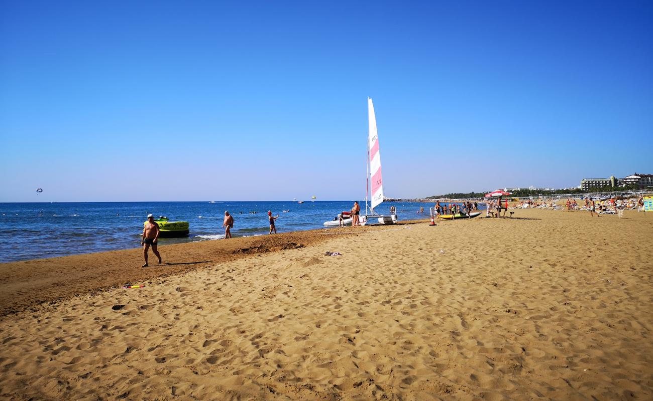 Photo of Side beach with brown fine sand surface