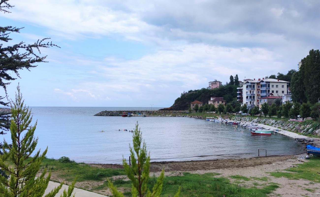 Photo of Kalecik Beach with bright sand & rocks surface