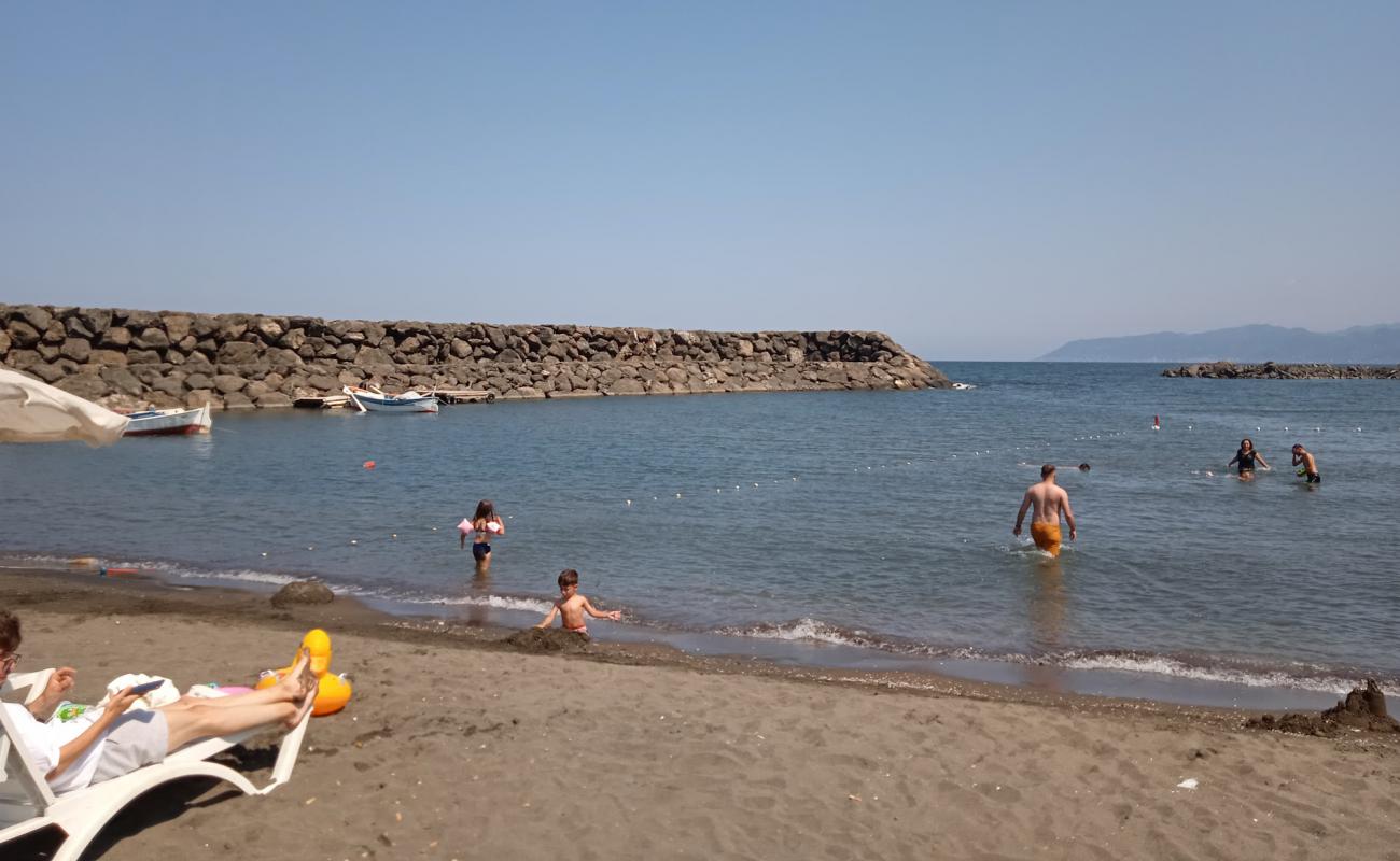 Photo of Besikduzu public beach with bright sand surface