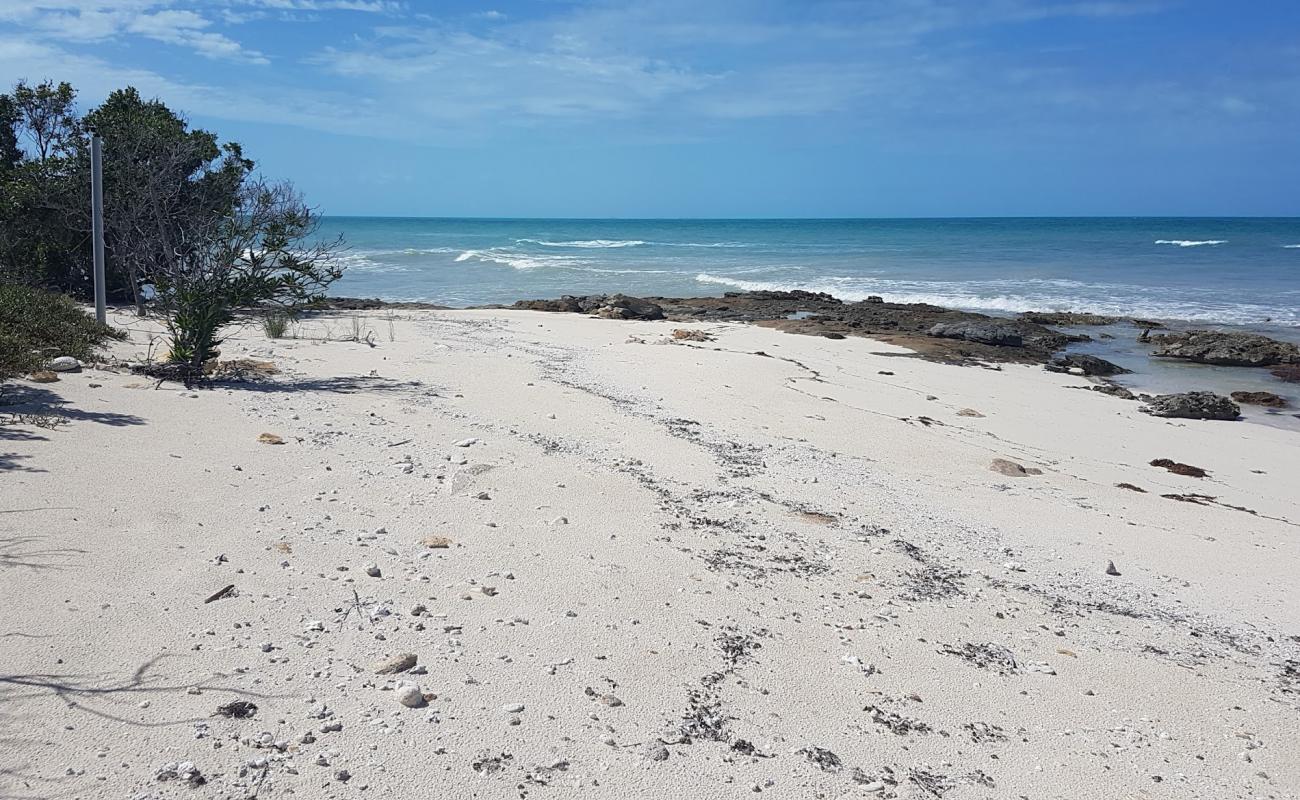 Photo of Simeon Rugby Hole beach with bright sand & rocks surface