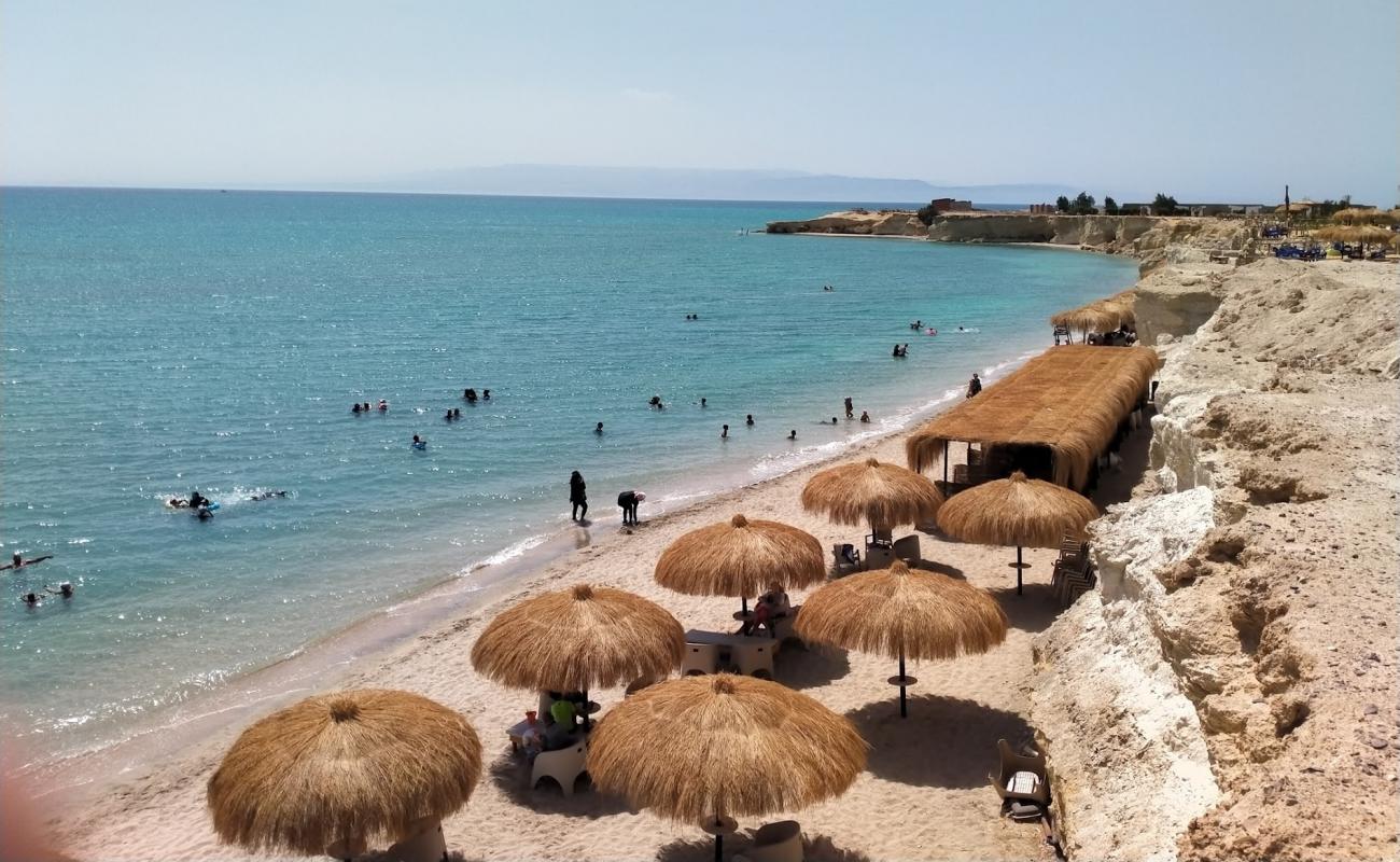 Photo of Tavira with bright sand surface