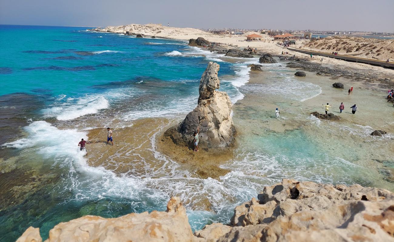 Photo of Cleopatra Bath Beach with bright sand & rocks surface