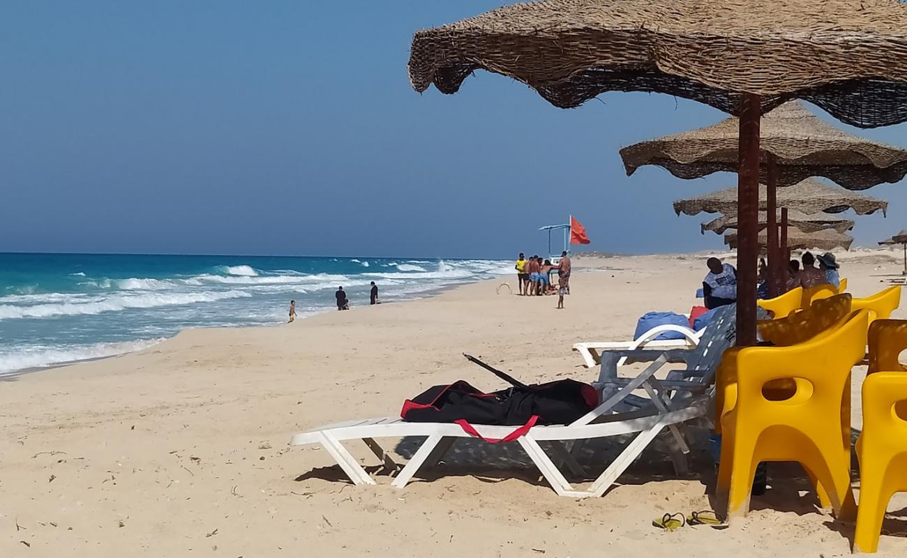 Photo of Rexyian Beach with bright fine sand surface