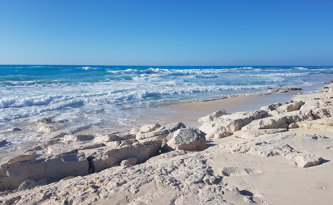 Photo of Paradise Beach with white fine sand surface