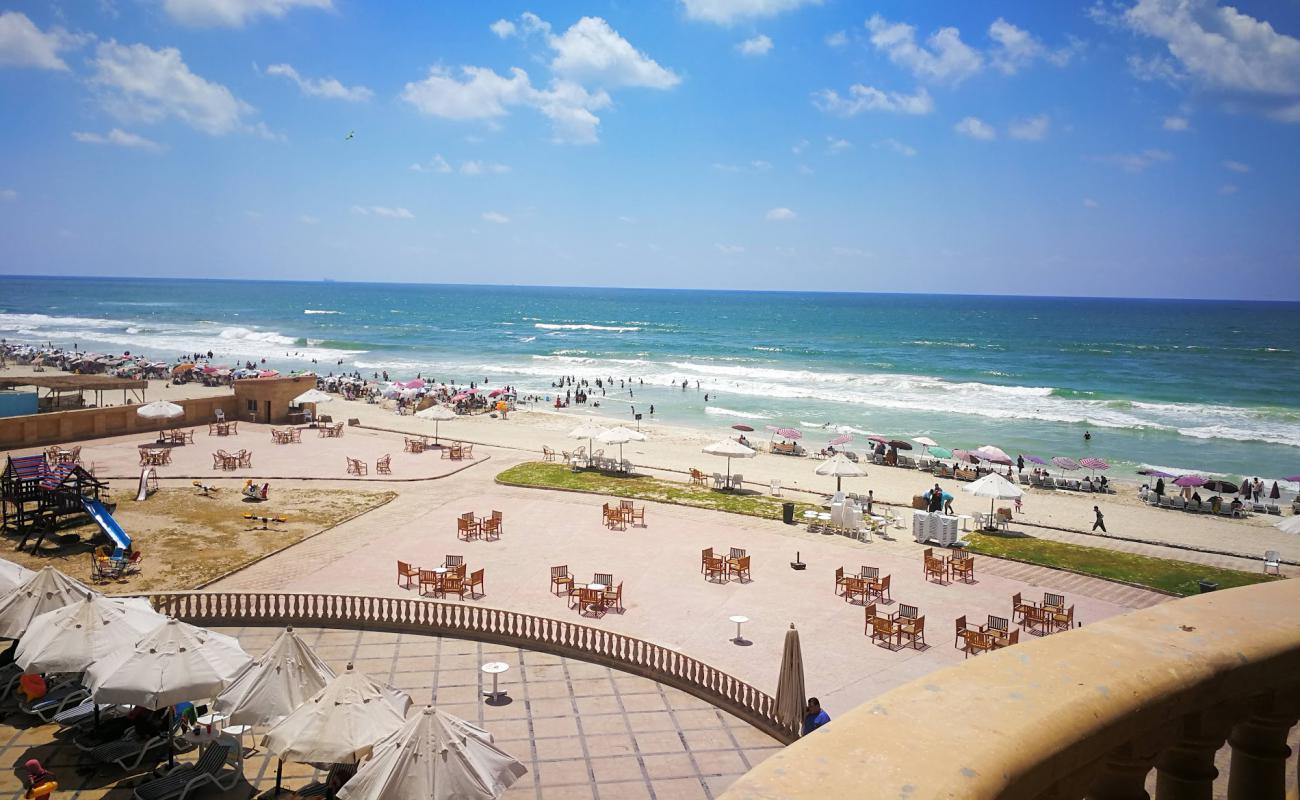 Photo of Al-Ajami Beach with white fine sand surface