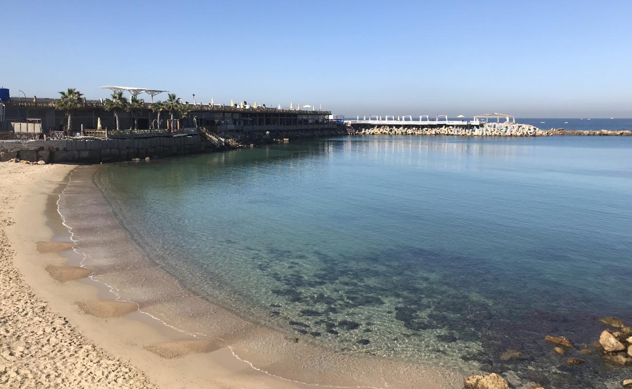 Photo of Teachers' Beach with bright sand surface