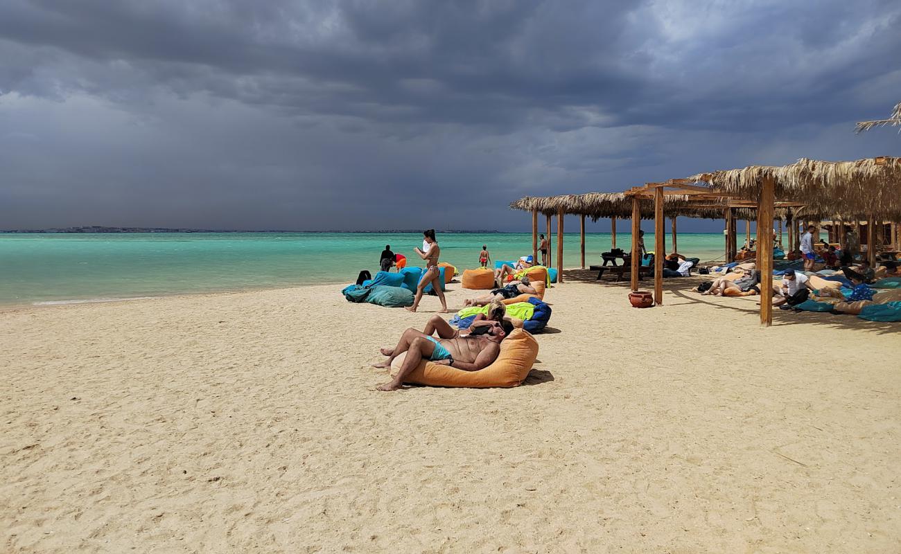 Photo of Orange Bay with bright sand surface