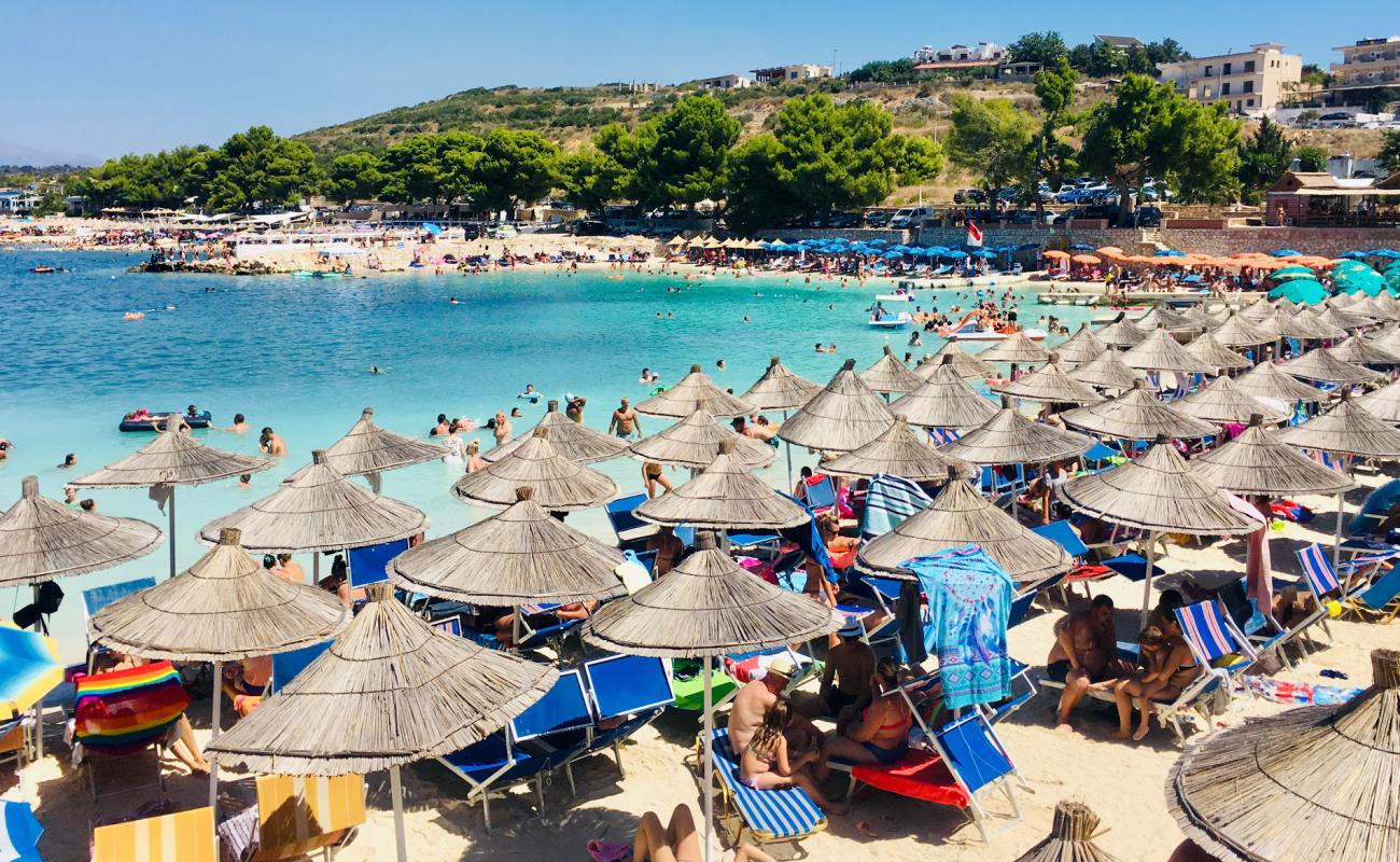 Photo of Ksamil Beach with brown fine pebble surface