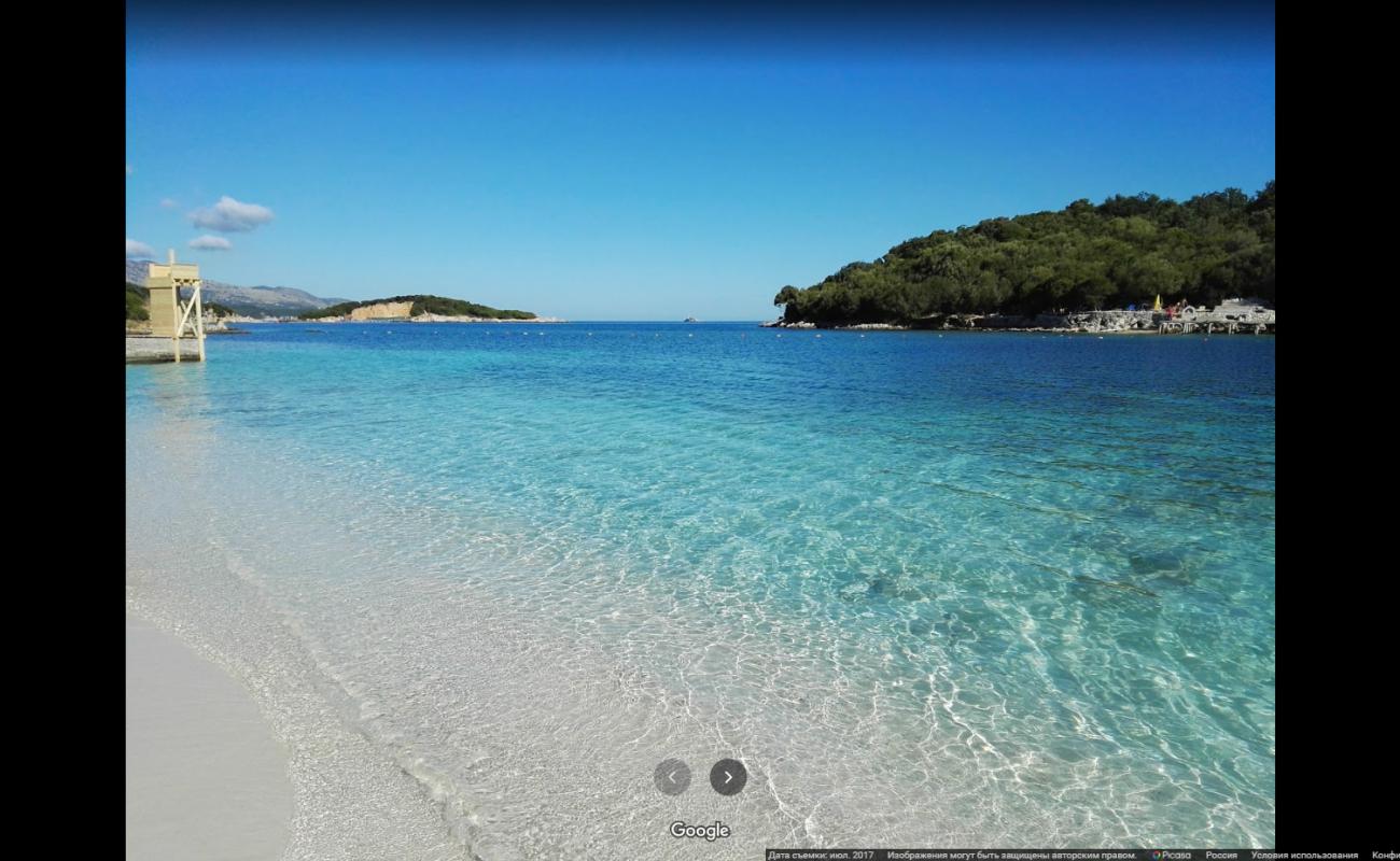 Photo of Isole Ksamil beach with light fine pebble surface