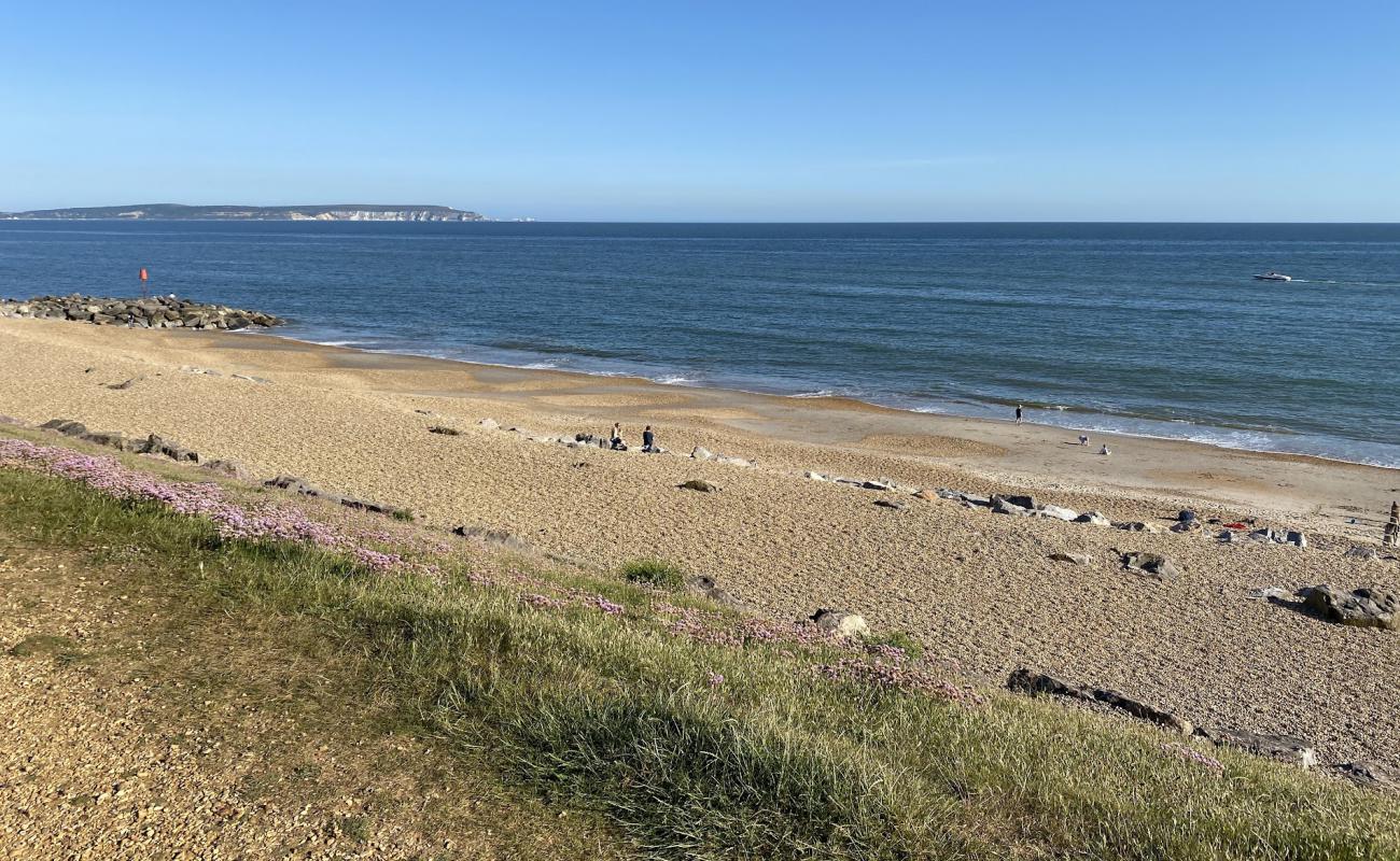 Photo of Barton-on-sea beach with light pebble surface