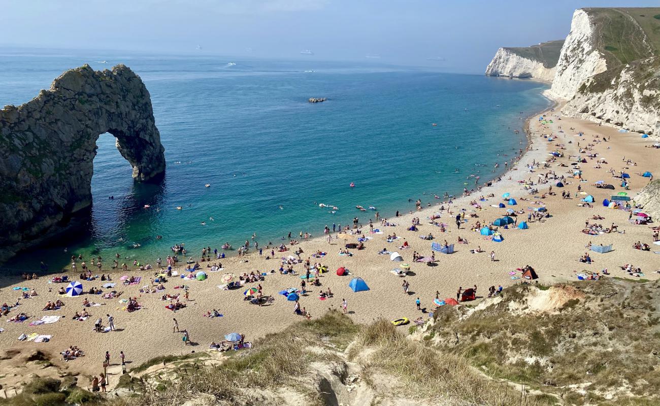 Photo of Durdle door beach with light fine pebble surface