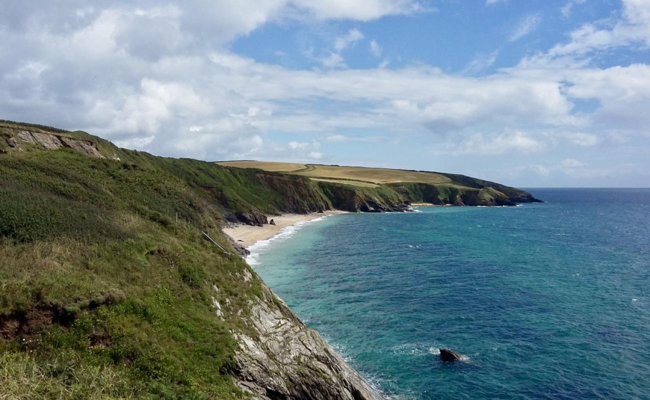 Photo of Porthbeor beach with gray sand surface