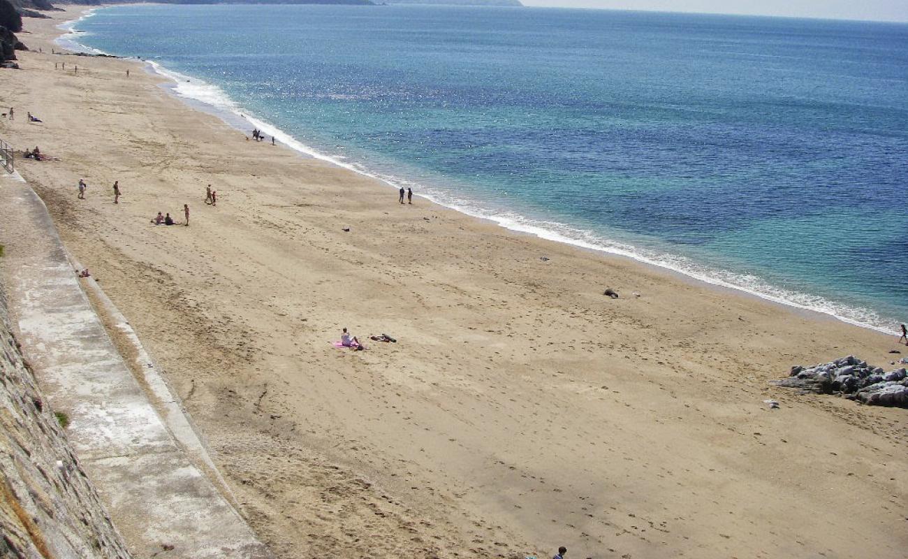 Photo of Porthleven beach with bright sand surface