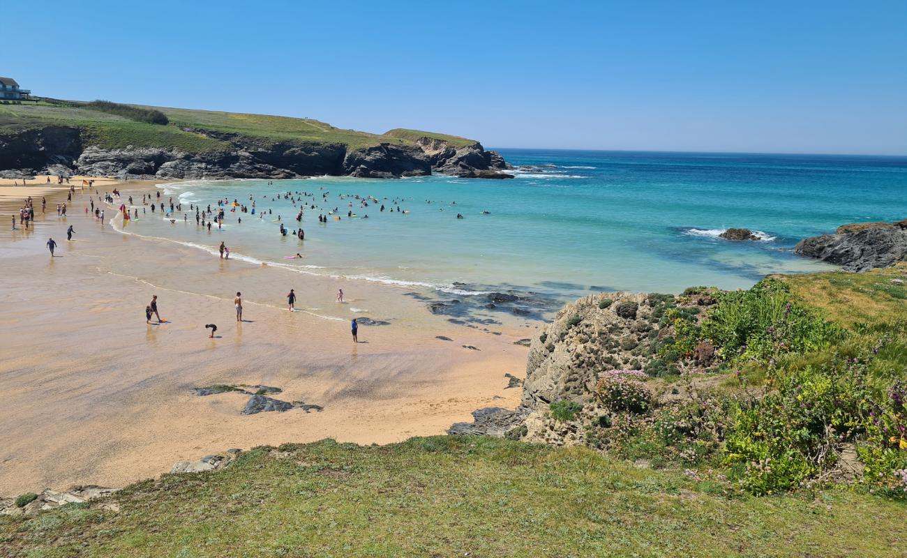 Photo of Treyarnon Bay with bright fine sand surface