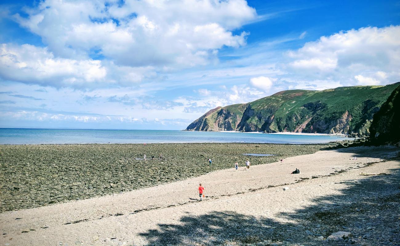 Photo of Blacklands beach with rocks cover surface