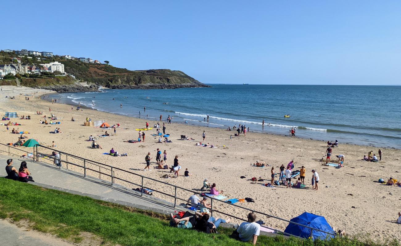 Photo of Langland Bay with light sand &  pebble surface