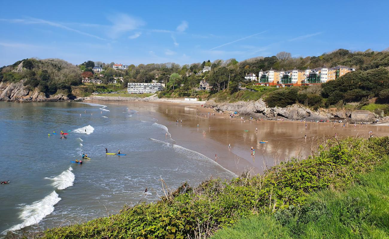 Photo of Caswell Bay beach with bright sand surface