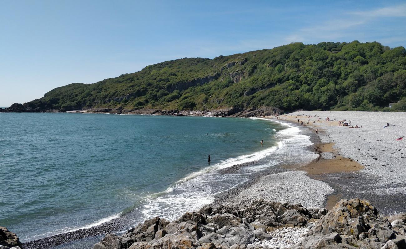 Photo of Pwll Du beach with gray pebble surface