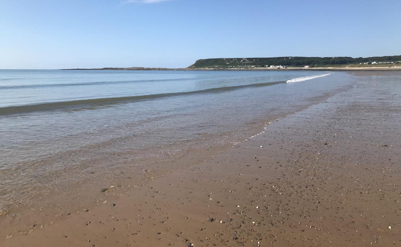 Photo of Port Eynon beach with black sand & pebble surface