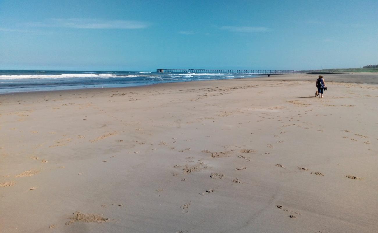 Photo of Crimdon beach with bright sand surface