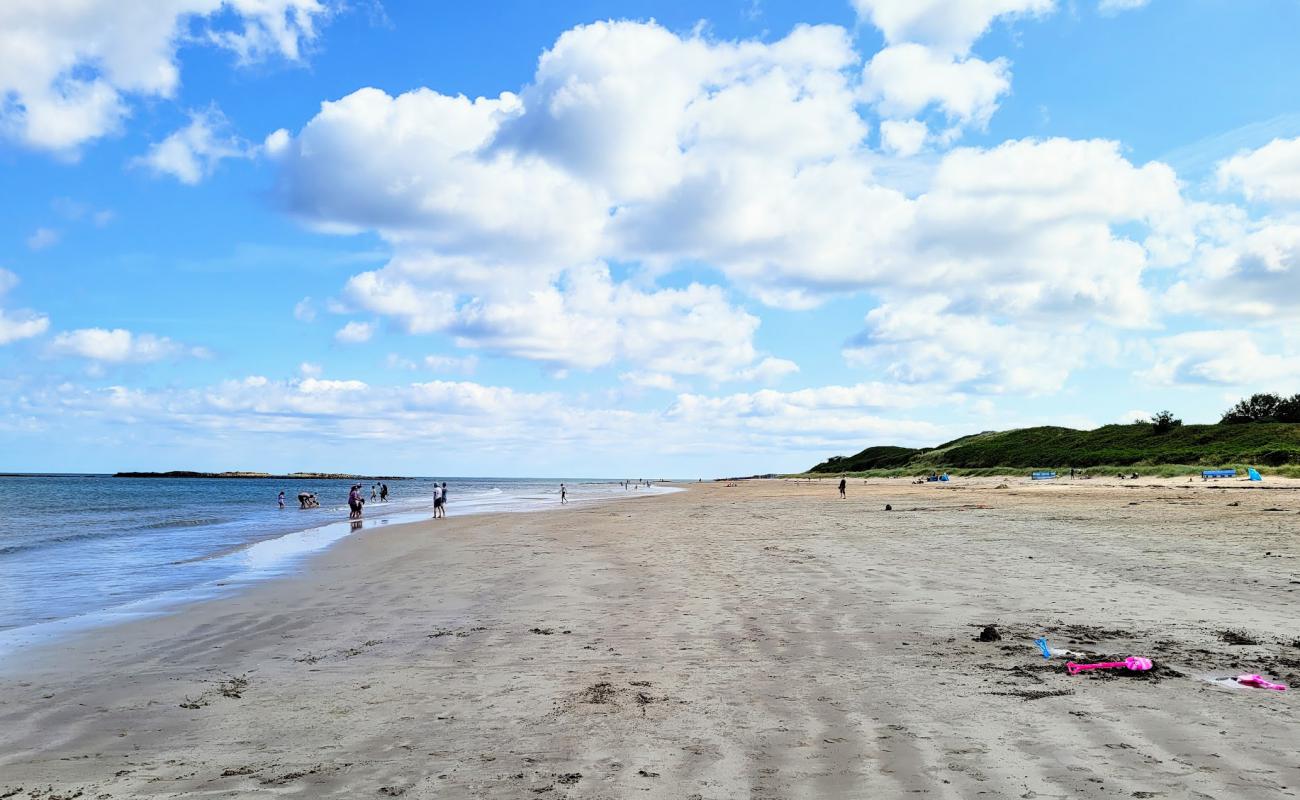 Photo of Low Newton beach with bright sand surface