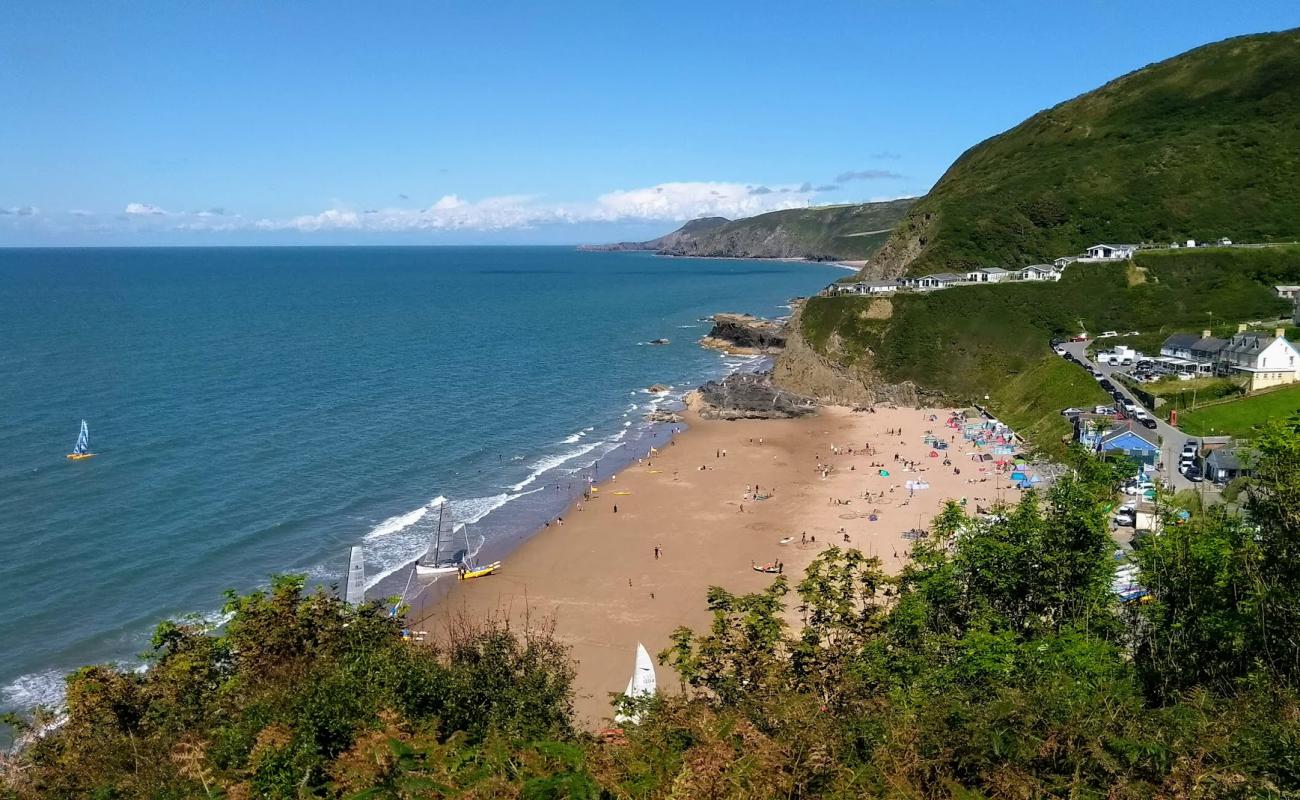 Photo of Tresaith beach with bright sand surface