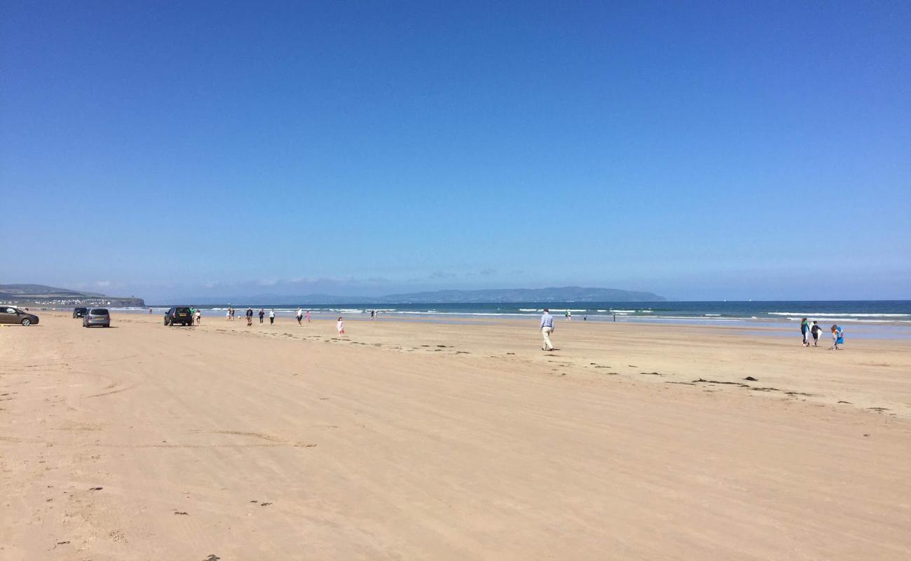 Photo of Portstewart Beach with bright sand surface