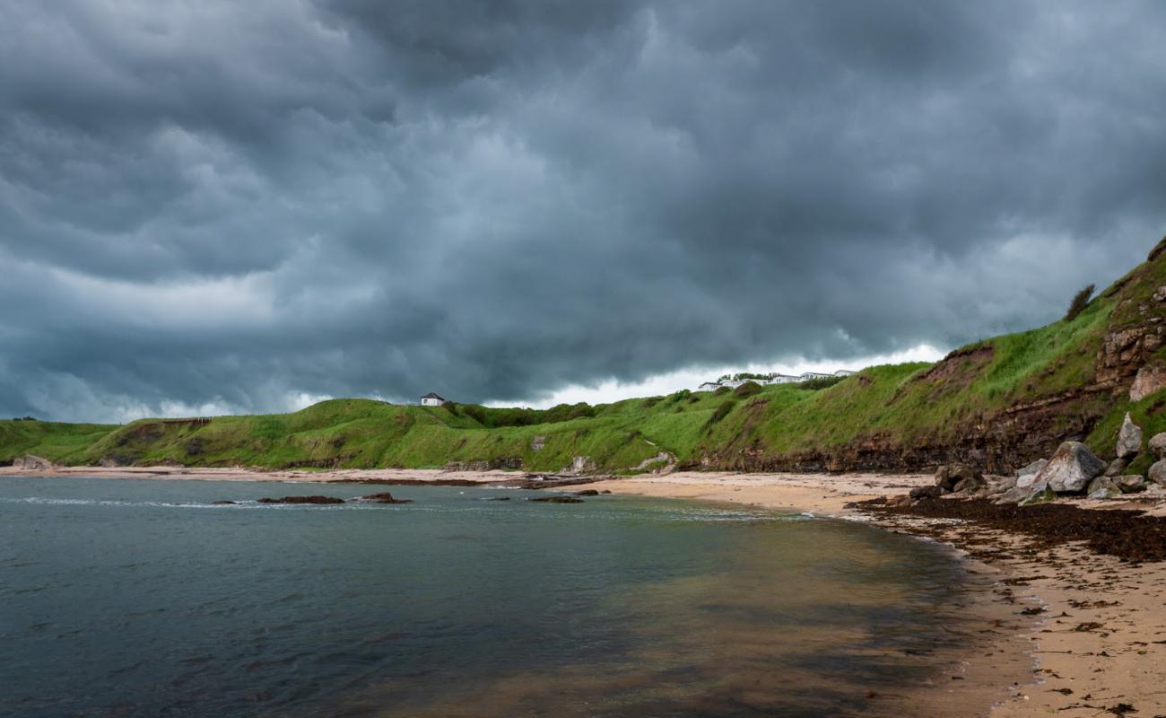 Photo of Spittal Beach with rocks cover surface