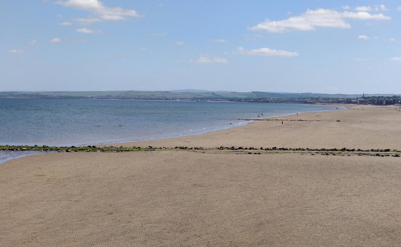 Photo of Beach Walk with bright sand surface