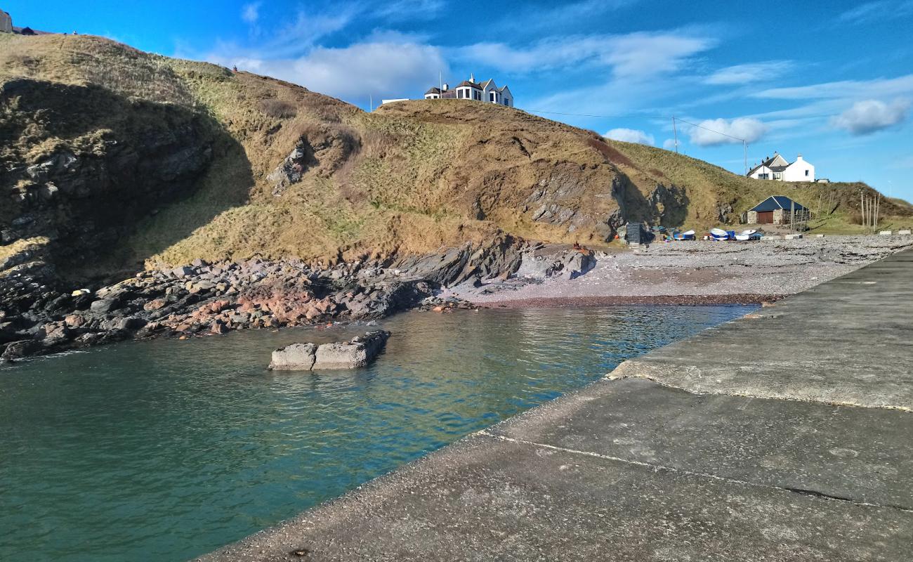 Photo of Cove Bay Harbour Beach with rocks cover surface