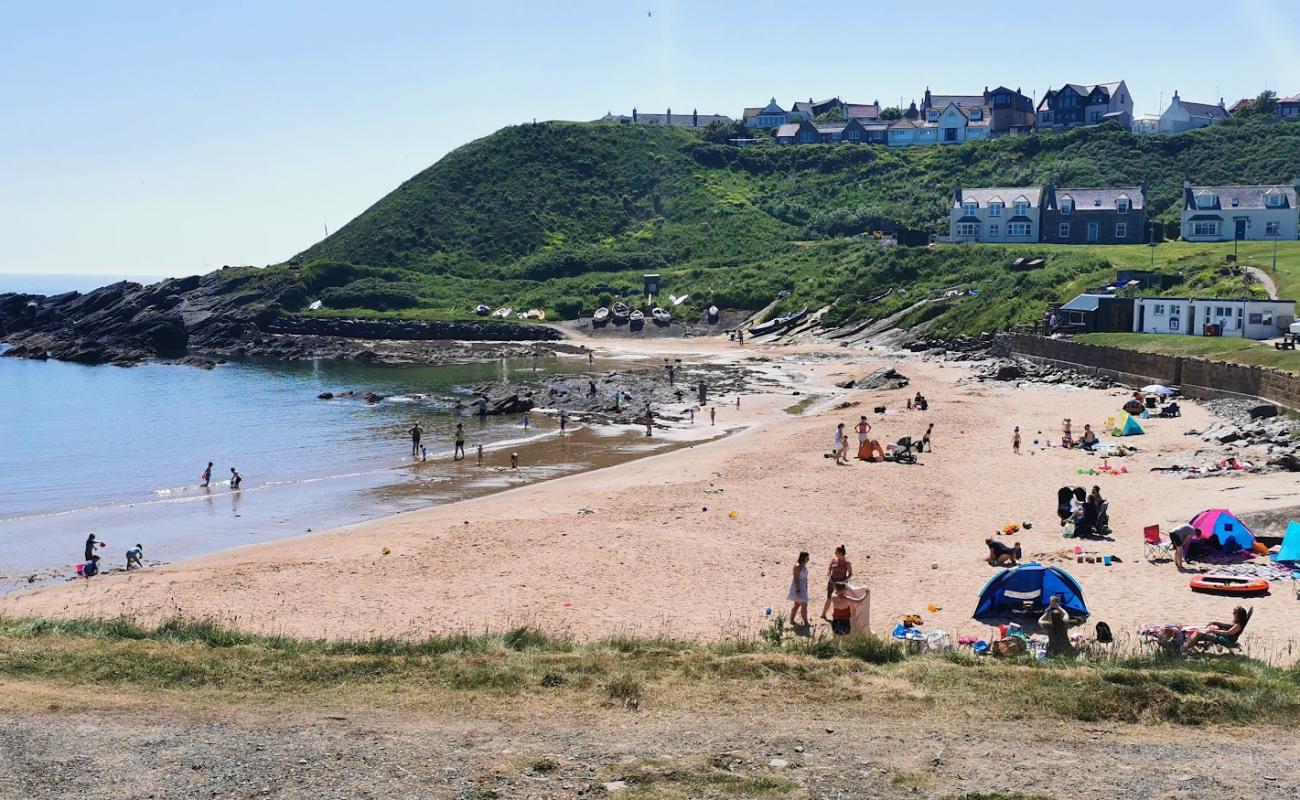 Photo of Collieston Beach with bright sand surface