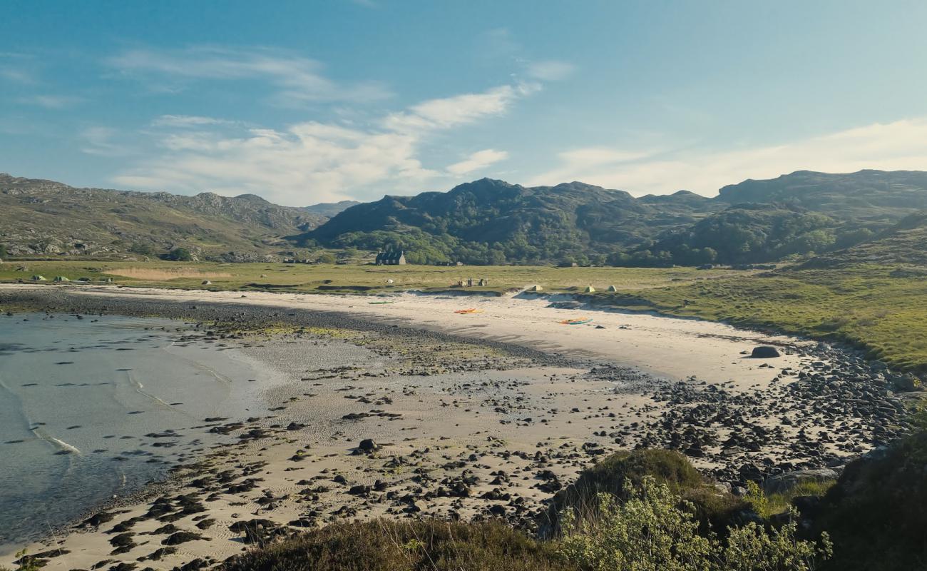 Photo of Peanmeanach Beach with bright sand & rocks surface