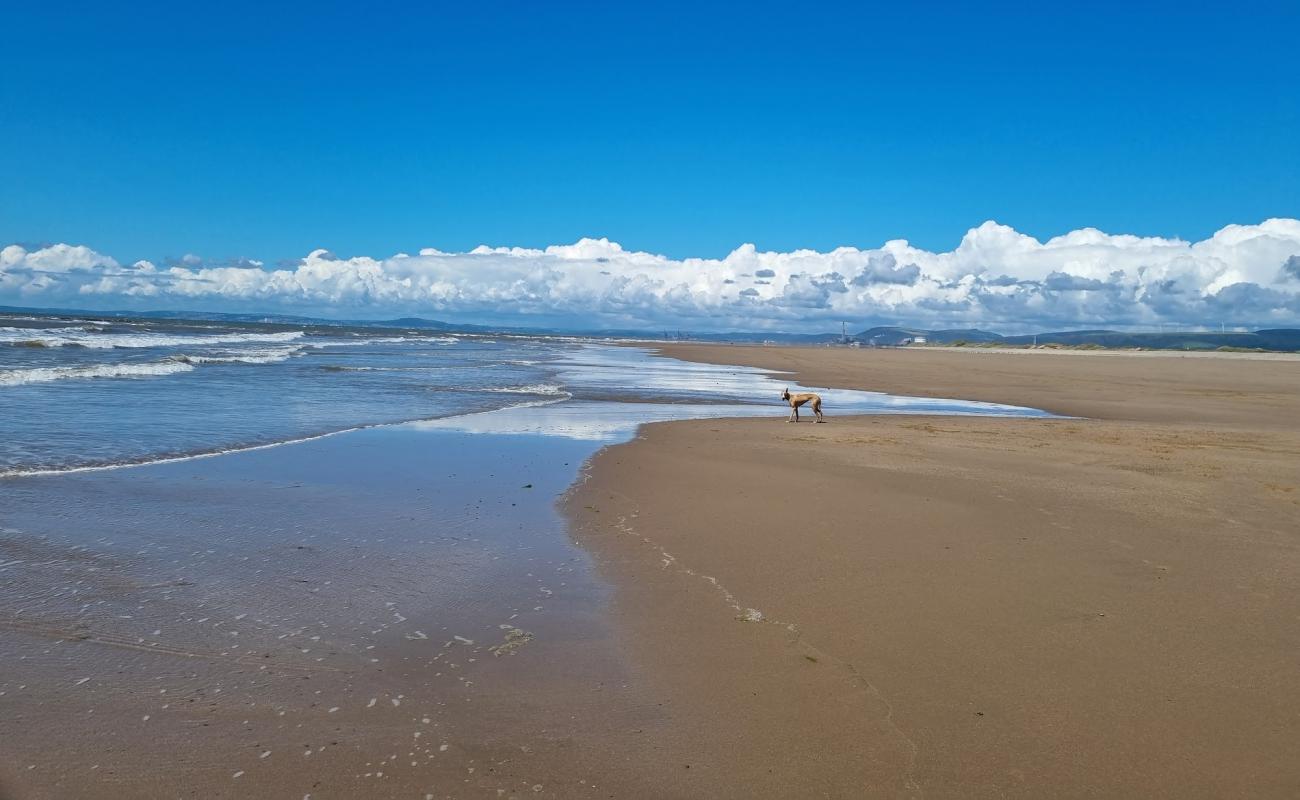 Photo of Sker Beach with gray sand &  pebble surface